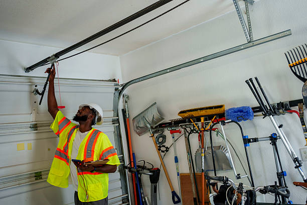 Professional Garage Door Panel Replacement technician working in McPherson, KS